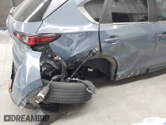 2023 Mazda CX-5 S Preferred z VIN JM3KFBCM3P0282220, wystawiony jako IAAI lot #43188220 z przebiegiem 29 080 mil mil oraz . Historia ofert i sprzedaży dostępna na DreamBid. Obrazek 6.