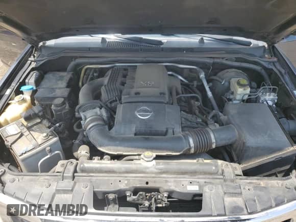 2015 Nissan Frontier SL with VIN 1N6AD0FV3FN732479, listed as a Copart auction lot 64464515 with 117,390 mi miles and Salvage title. Bid and sale history available at DreamBid. Image 11.