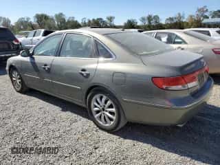 2007 Hyundai Azera SE с VIN KMHFC46F47A237532, выставлен на аукционе Copart как лот 75699814 с пробегом 196 490 миль миль и На запчасти • Non repairable. История ставок и продаж доступна на DreamBid. Изображение 2.