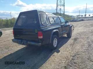 2002 Dodge Dakota with VIN 1B7GG16X12S702937, listed as a IAAI auction lot 43410215 with Not provided miles and . Bid and sale history available at DreamBid. Image 4.