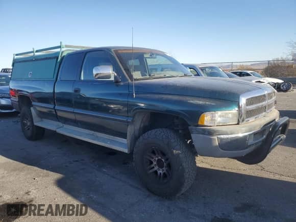 1997 Dodge 2500 with VIN 3B7KF23W4VM528115, listed as a Copart auction lot 43407685 with 167,132 mi miles and Salvage title. Bid and sale history available at DreamBid. Image 4.