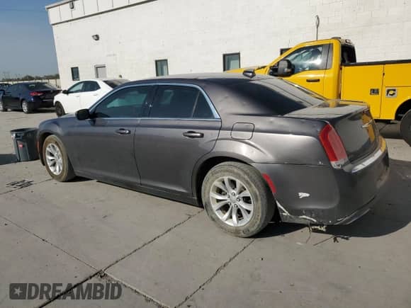 2015 Chrysler 300 Limited with VIN 2C3CCAAG2FH749591, listed as a Copart auction lot 63632155 with 143,242 mi miles and Salvage title. Bid and sale history available at DreamBid. Image 2.