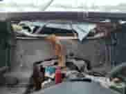 2002 Chevrolet Suburban LT z VIN 3GNEC16Z92G194431, wystawiony jako Copart lot #71030364 z przebiegiem Nie podano mil oraz Nie do naprawy • Non repairable. Historia ofert i sprzedaży dostępna na DreamBid. Obrazek 9.