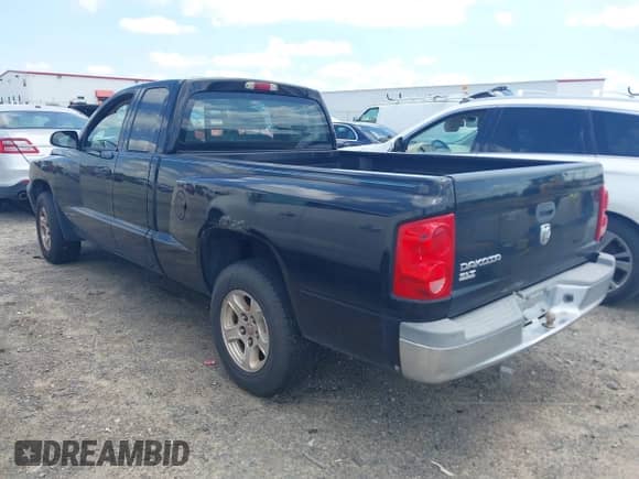2005 Dodge Dakota SLT with VIN 1D7HE42K85S198645, listed as a IAAI auction lot 42801906 with 228,200 mi miles and . Bid and sale history available at DreamBid. Image 3.