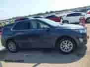 2020 Chevrolet Equinox LT z VIN 2GNAXKEVXL6267097, wystawiony jako IAAI lot #42955839 z przebiegiem 132 092 mil mil oraz . Historia ofert i sprzedaży dostępna na DreamBid. Obrazek 13.