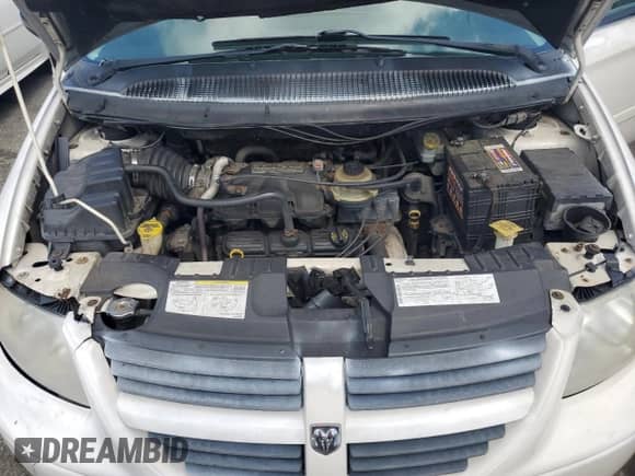 2005 Dodge Caravan SXT с VIN 2D4GP44L65R448359, выставлен на аукционе Copart как лот 69009715 с пробегом 157 079 миль миль и Списание • Salvage title. История ставок и продаж доступна на DreamBid. Изображение 12.