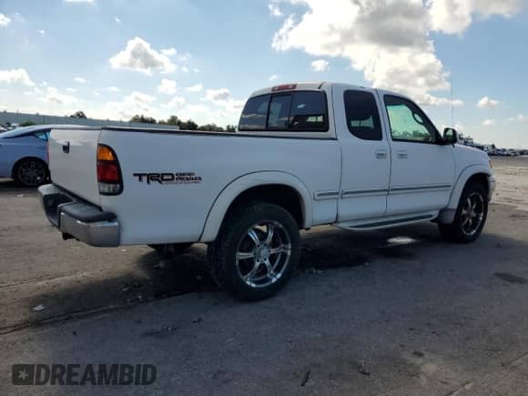 2002 Toyota Tundra Limited with VIN 5TBBT48172S298091, listed as a Copart auction lot 81839095 with 191,659 mi miles and Salvage title. Bid and sale history available at DreamBid. Image 3.