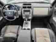 2008 Mercury Mariner Premier with VIN 4M2CU97108KJ12909, listed as a Copart auction lot 70864465 with 128,018 mi miles and Salvage title. Bid and sale history available at DreamBid. Image 8.