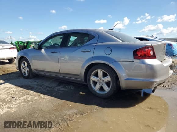 2013 Dodge Avenger SE with VIN 1C3CDZAB5DN535988, listed as a Copart auction lot 82389325 with 172,205 mi miles and Salvage title. Bid and sale history available at DreamBid. Image 2.