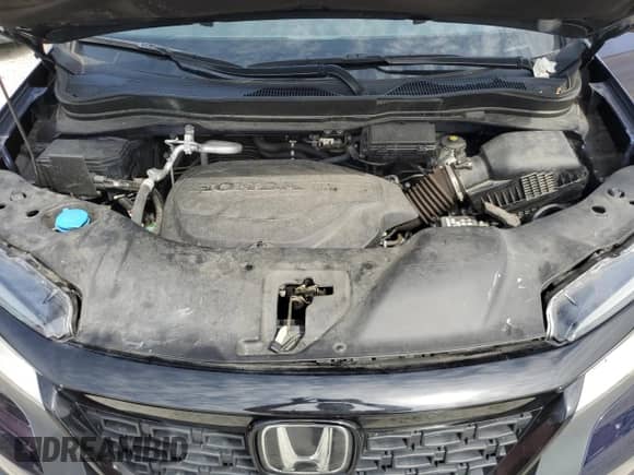 2021 Honda Passport Touring with VIN 5FNYF8H99MB042984, listed as a Copart auction lot 52858975 with 35,308 mi miles and Salvage title. Bid and sale history available at DreamBid. Image 12.