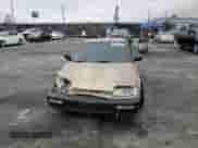 1990 Honda Civic with VIN 2HGED6343LH555344, listed as a Copart auction lot 51232765 with 217,533 mi miles and Salvage title. Bid and sale history available at DreamBid. Image 11.