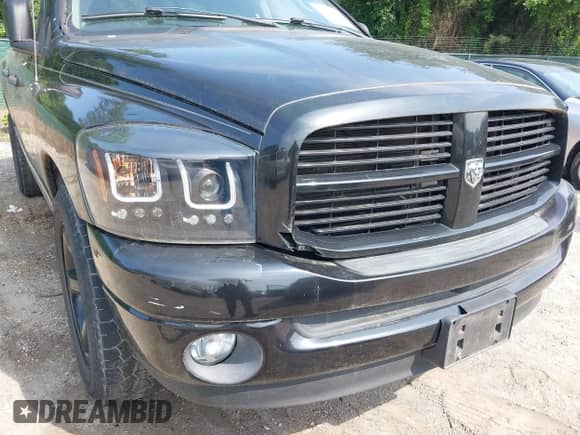 2007 Dodge 1500 SLT with VIN 1D7HA18P07S272687, listed as a IAAI auction lot 42452424 with 199,602 mi miles and . Bid and sale history available at DreamBid. Image 13.