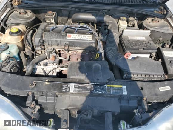 2001 Saturn SC with VIN 1G8ZR12711Z109068, listed as a Copart auction lot 72353914 with 116,559 mi miles and Salvage title. Bid and sale history available at DreamBid. Image 11.
