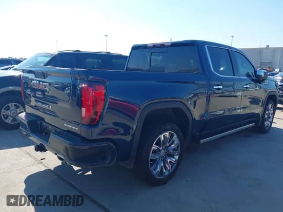 2023 GMC Sierra 1500 Denali with VIN 3GTPHGED2PG210522, listed as a IAAI auction lot 43096747 with 17,371 mi miles and . Bid and sale history available at DreamBid. Image 4.