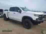 2023 Chevrolet Silverado 1500 ZR2 with VIN 3GCUDHEL5PG153230, listed as a Copart auction lot 54396335 with 46,887 mi miles and Salvage title. Bid and sale history available at DreamBid. Image 4.