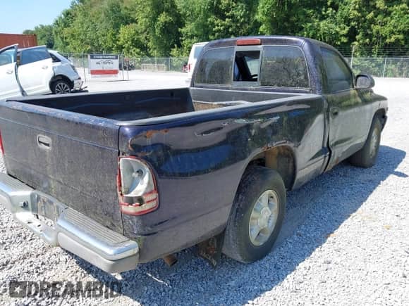 1999 Dodge Dakota SLT z VIN 1B7FL26X3XS128362, wystawiony jako IAAI lot #42952135 z przebiegiem 179 429 mil mil oraz . Historia ofert i sprzedaży dostępna na DreamBid. Obrazek 6.