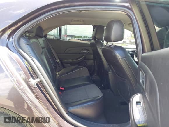 2015 Chevrolet Malibu LT z VIN 1G11C5SL1FF203669, wystawiony jako IAAI lot #43173679 z przebiegiem 172 863 mil mil oraz . Historia ofert i sprzedaży dostępna na DreamBid. Obrazek 8.