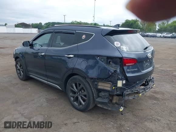 2017 Hyundai Santa Fe Ultimate с VIN 5XYZWDLAXHG486646, выставлен на аукционе IAAI как лот 42718690 с пробегом 117 430 миль миль и . История ставок и продаж доступна на DreamBid. Изображение 3.