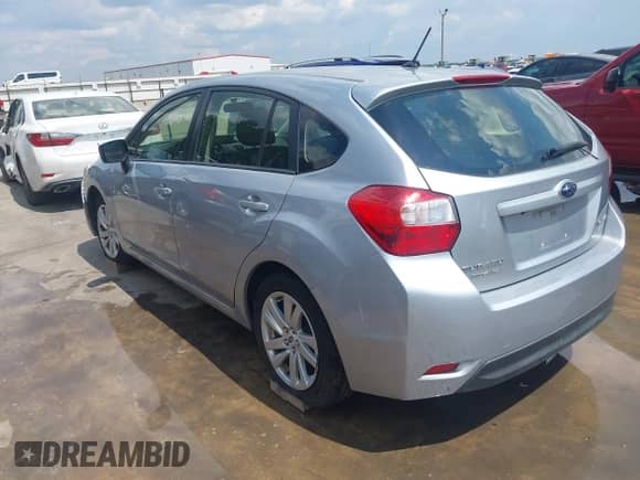 2015 Subaru Impreza Premium with VIN JF1GPAC68FH208160, listed as a IAAI auction lot 42983145 with 67,518 mi miles and . Bid and sale history available at DreamBid. Image 3.