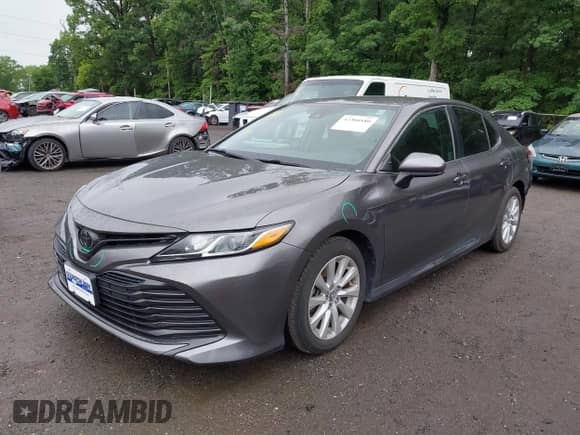 2019 Toyota Camry LE с VIN 4T1B11HK0KU808082, выставлен на аукционе IAAI как лот 42306880 с пробегом 59 284 миль миль и . История ставок и продаж доступна на DreamBid. Изображение 2.