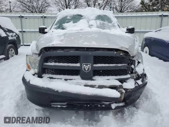 2012 Ram 1500 ST z VIN 3C6JD6DP2CG207886, wystawiony jako Copart lot #41557525 z przebiegiem 246 807 mil mil oraz Szkoda całkowita • Salvage title. Historia ofert i sprzedaży dostępna na DreamBid. Obrazek 5.