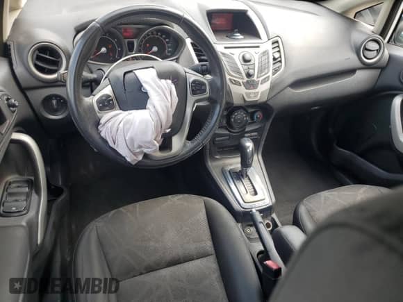 2012 Ford Fiesta SEL with VIN 3FADP4CJ8CM181297, listed as a Copart auction lot 65320455 with 194,665 mi miles and Salvage title. Bid and sale history available at DreamBid. Image 8.