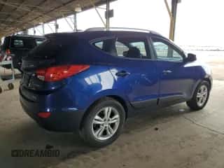 2010 Hyundai Tucson GLS z VIN KM8JUCAC7AU099764, wystawiony jako Copart lot #85824465 z przebiegiem 140 090 mil mil oraz Szkoda całkowita • Salvage title. Historia ofert i sprzedaży dostępna na DreamBid. Obrazek 3.
