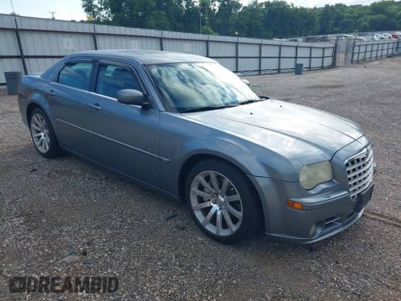 2006 Chrysler 300 C SRT-8 with VIN 2C3LA73W66H523504, listed as a IAAI auction lot 42483103 with 61,560 mi miles and . Bid and sale history available at DreamBid. Image 1.