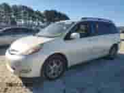 2006 Toyota Sienna XLE Limited z VIN 5TDZA22C16S411890, wystawiony jako Copart lot #82412005 z przebiegiem 187 414 mil mil oraz Szkoda całkowita • Salvage title. Historia ofert i sprzedaży dostępna na DreamBid. Obrazek 1.