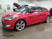 2012 Hyundai Veloster w/Black Int z VIN KMHTC6AD3CU049324, wystawiony jako Copart lot #85596195 z przebiegiem 171 178 mil mil oraz Szkoda całkowita • Salvage title. Historia ofert i sprzedaży dostępna na DreamBid. Obrazek 1.