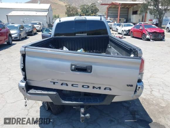 2020 Toyota Tacoma SR5 z VIN 3TMBZ5DN3LM025980, wystawiony jako IAAI lot #42215140 z przebiegiem 67 414 mil mil oraz . Historia ofert i sprzedaży dostępna na DreamBid. Obrazek 16.
