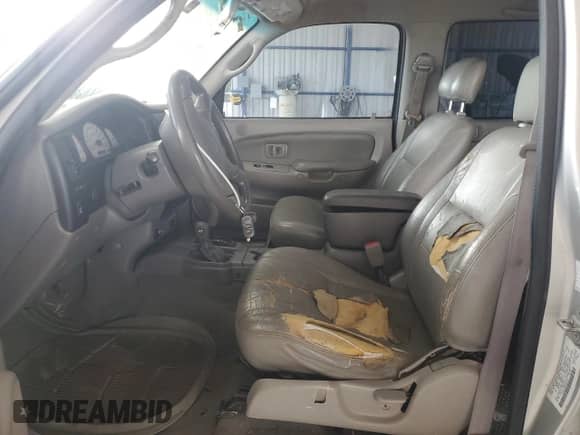 2002 Toyota Tacoma z VIN 5TEHN72N42Z042373, wystawiony jako Copart lot #71019875 z przebiegiem 297 085 mil mil oraz Szkoda całkowita • Salvage title. Historia ofert i sprzedaży dostępna na DreamBid. Obrazek 7.