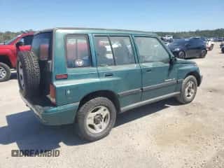 1997 Chevrolet Tracker с VIN 2CNBJ1360V6913489, выставлен на аукционе Copart как лот 57440585 с пробегом 169 694 миль миль и Чистый • Clean title. История ставок и продаж доступна на DreamBid. Изображение 3.