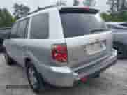 2006 Honda Pilot EX-L z VIN 5FNYF28746B047427, wystawiony jako IAAI lot #42143088 z przebiegiem 154 272 mil mil oraz . Historia ofert i sprzedaży dostępna na DreamBid. Obrazek 3.