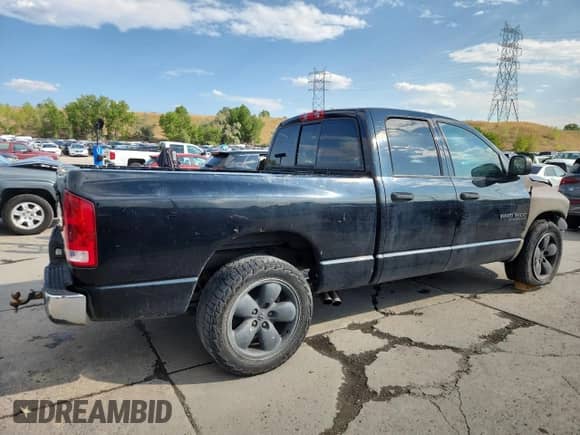 2005 Dodge 1500 SLT with VIN 1D7HA18D05S279772, listed as a Copart auction lot 71243615 with 217,186 mi miles and Salvage title. Bid and sale history available at DreamBid. Image 3.