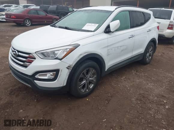 2014 Hyundai Santa Fe с VIN 5XYZU3LB1EG135810, выставлен на аукционе IAAI как лот 43312775 с пробегом 99 730 миль миль и . История ставок и продаж доступна на DreamBid. Изображение 17.