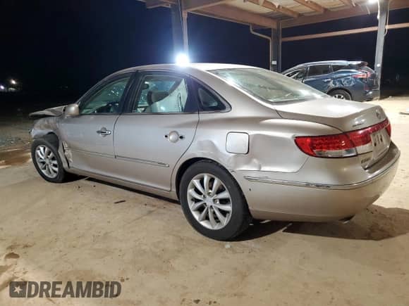 2006 Hyundai Azera SE z VIN KMHFC46F86A128070, wystawiony jako Copart lot #88057915 z przebiegiem Nie podano mil oraz Szkoda całkowita • Salvage title. Historia ofert i sprzedaży dostępna na DreamBid. Obrazek 2.