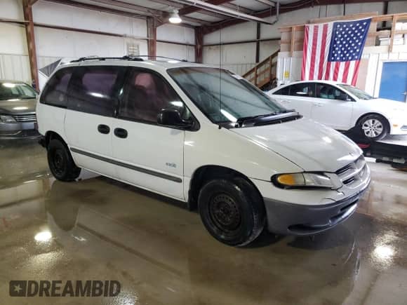 2000 Dodge Caravan with VIN 2B4GP25G4YR791420, listed as a Copart auction lot 83426754 with 141,635 mi miles and Salvage title. Bid and sale history available at DreamBid. Image 4.