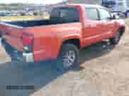 2018 Toyota Tacoma SR5 with VIN 5TFAZ5CN4JX064016, listed as a IAAI auction lot 43222144 with 74,935 mi miles and . Bid and sale history available at DreamBid. Image 4.