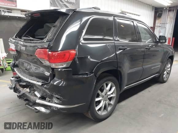 2015 Jeep Grand Cherokee Summit с VIN 1C4RJFJM6FC775709, выставлен на аукционе IAAI как лот 42818098 с пробегом 104 979 миль миль и . История ставок и продаж доступна на DreamBid. Изображение 4.