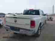 2018 Ram 1500 Laramie with VIN 1C6RR7NT1JS159292, listed as a IAAI auction lot 42893290 with 104,339 mi miles and . Bid and sale history available at DreamBid. Image 4.