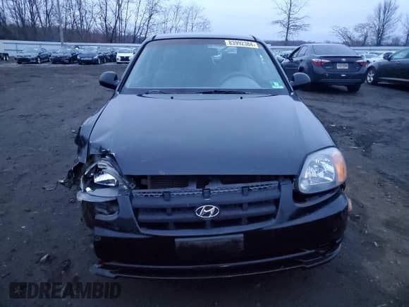 2004 Hyundai Accent GL с VIN KMHCG35CX4U312284, выставлен на аукционе Copart как лот 83992384 с пробегом 88 786 миль миль и Списание • Salvage title. История ставок и продаж доступна на DreamBid. Изображение 5.