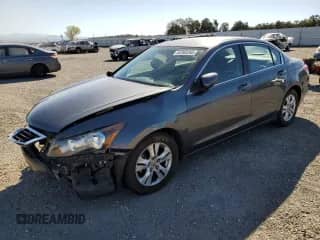 2010 Honda Accord LX-P z VIN 1HGCP2F46AA085597, wystawiony jako Copart lot #82365265 z przebiegiem 78 169 mil mil oraz Szkoda całkowita • Salvage title. Historia ofert i sprzedaży dostępna na DreamBid. Obrazek 1.