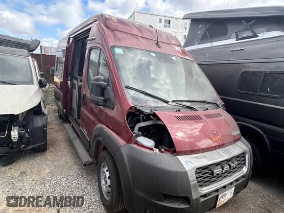 2022 Ram ProMaster Cargo with VIN 3C6MRVJG7NE141802, listed as a IAAI auction lot 43215219 with Not provided miles and . Bid and sale history available at DreamBid. Image 1.