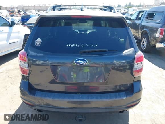 2014 Subaru Forester XT Premium with VIN JF2SJGDC0EH520728, listed as a IAAI auction lot 43336202 with 165,577 mi miles and . Bid and sale history available at DreamBid. Image 16.