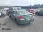 2014 Subaru Impreza with VIN JF1GJAA63EH012985, listed as a IAAI auction lot 42958690 with 202,550 mi miles and . Bid and sale history available at DreamBid. Image 3.