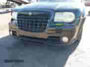 2006 Chrysler 300 C SRT-8 with VIN 2C3LA73W86H388896, listed as a IAAI auction lot 40599030 with 152,547 mi miles and . Bid and sale history available at DreamBid. Image 6.