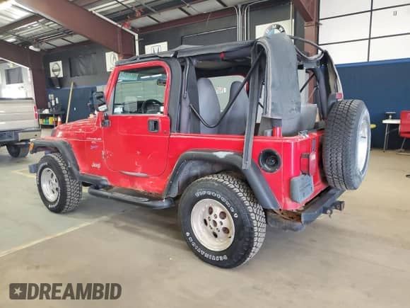 1998 Jeep Wrangler Sport с VIN 1J4FY19S1WP787158, выставлен на аукционе Copart как лот 89796475 с пробегом 192 654 миль миль и Чистый • Clean title. История ставок и продаж доступна на DreamBid. Изображение 2.