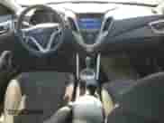 2014 Hyundai Veloster с VIN KMHTC6AD1EU185146, выставлен на аукционе Copart как лот 81635215 с пробегом 133 432 миль миль и Чистый • Clean title. История ставок и продаж доступна на DreamBid. Изображение 8.