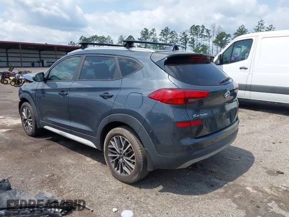 2019 Hyundai Tucson Sport z VIN KM8J33AL3KU937888, wystawiony jako IAAI lot #42310448 z przebiegiem 99 501 mil mil oraz . Historia ofert i sprzedaży dostępna na DreamBid. Obrazek 3.